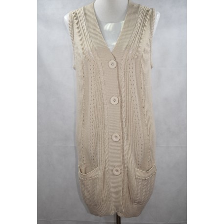 Jersey lana sin manga con bolsillo talla G.